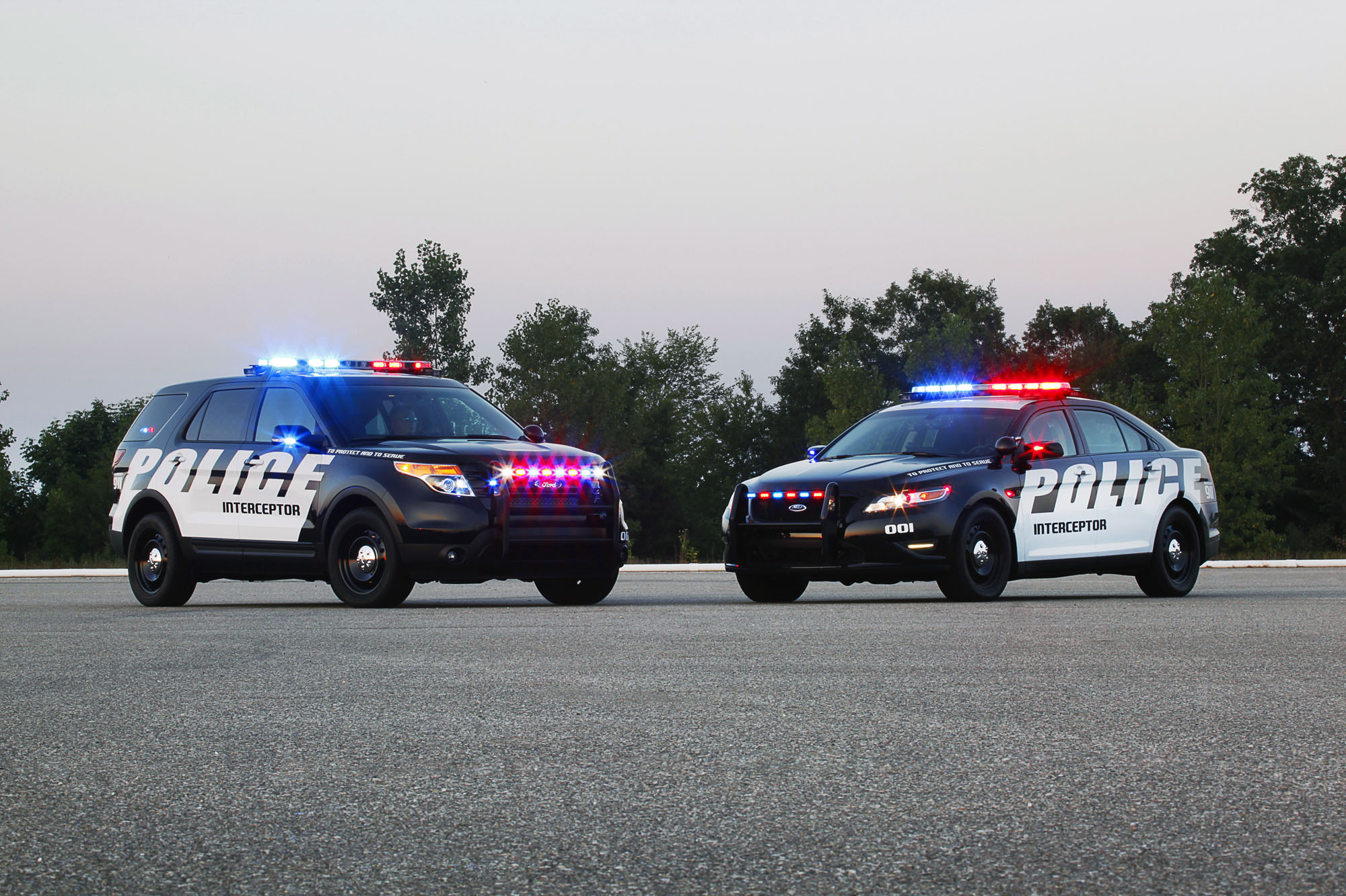 Ford Police Interceptor utility vehicle: The all-new Ford Police Interceptor utility (left) and Police Interceptor sedan (right) comprise Ford's first-ever police portfolio. (09/01/2010)